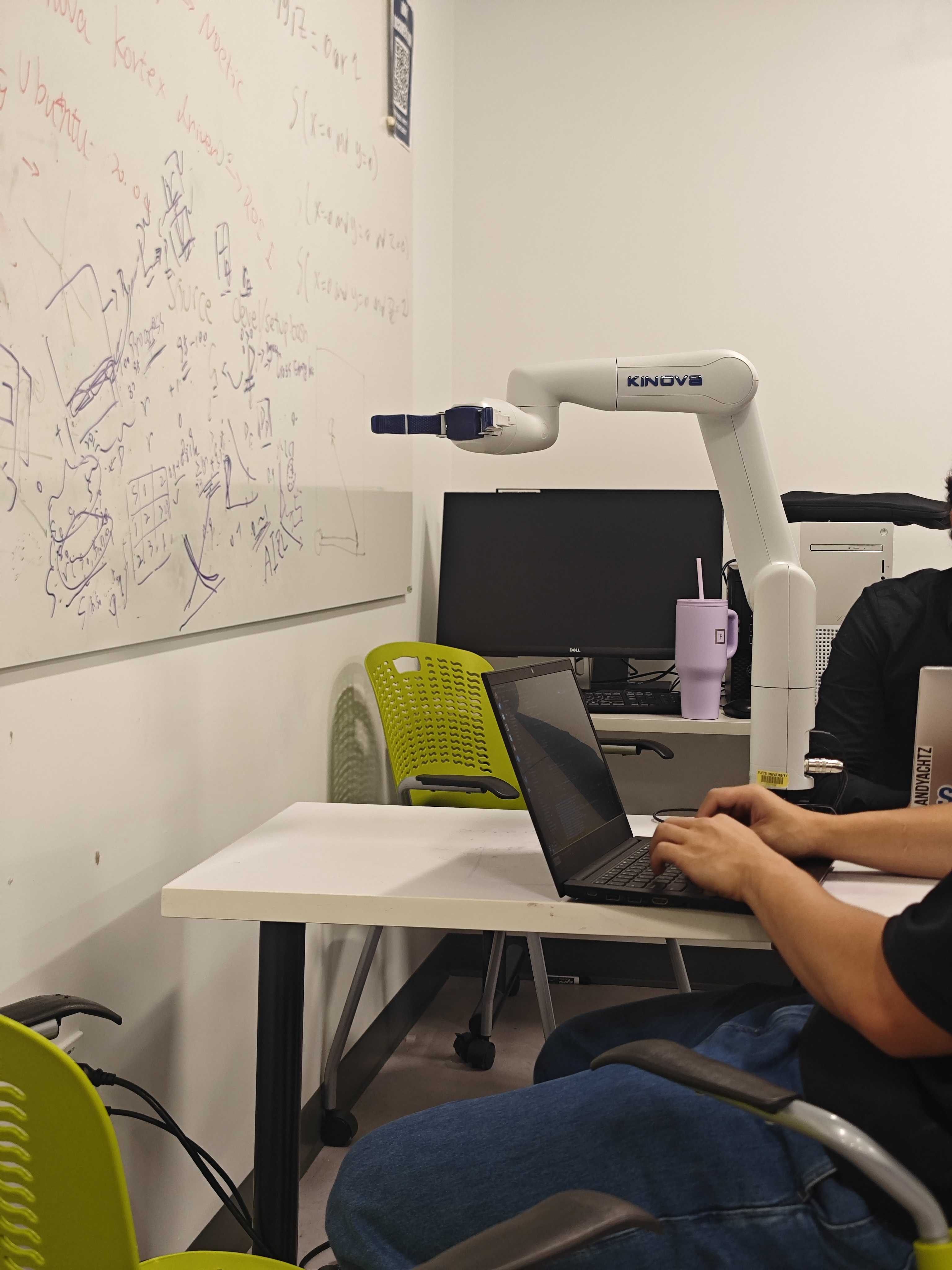 Students and robots in the lab